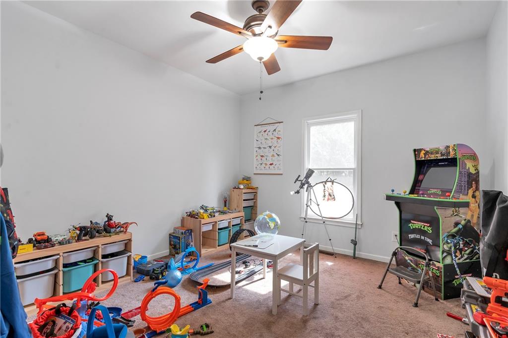 1224 Treemont Trace Winder, GA 30680 - Photo 15 of 27 a view of a workspace with furniture