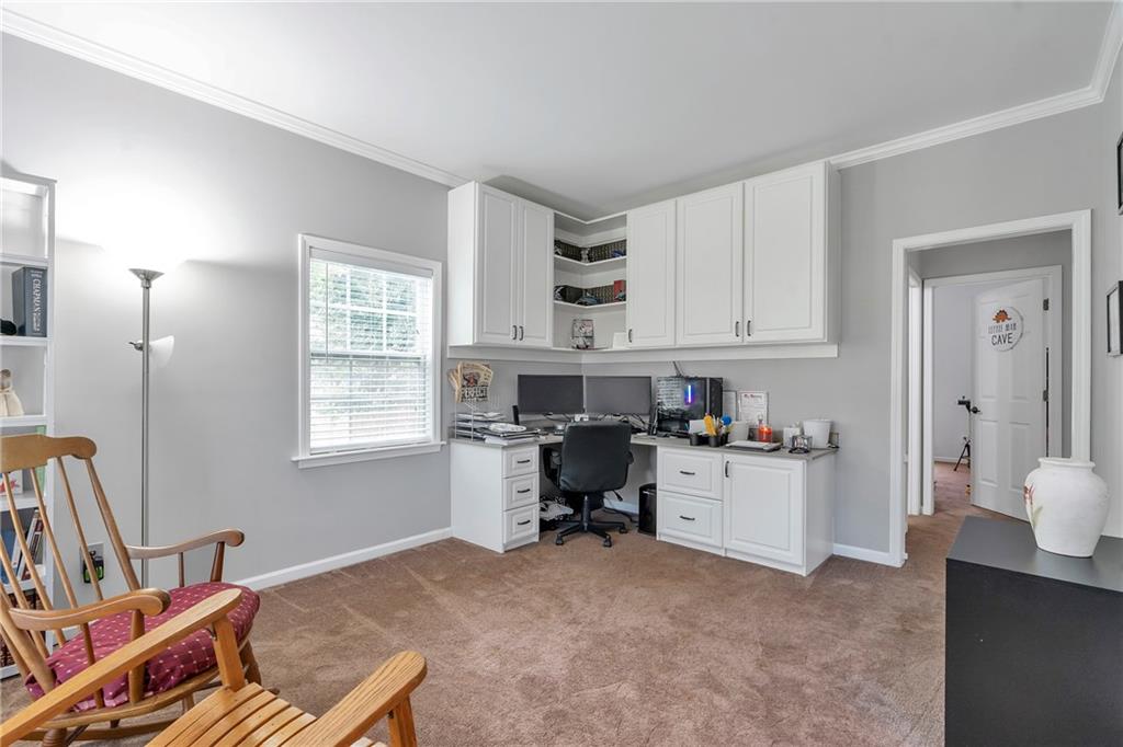 1224 Treemont Trace Winder, GA 30680 - Photo 16 of 27 a room with a workspace