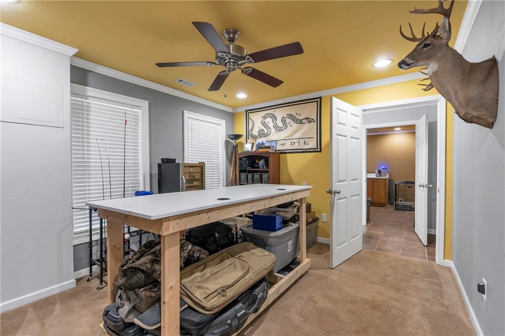 1224 Treemont Trace Winder, GA 30680 - Photo 22 of 27 a view of a workspace with furniture