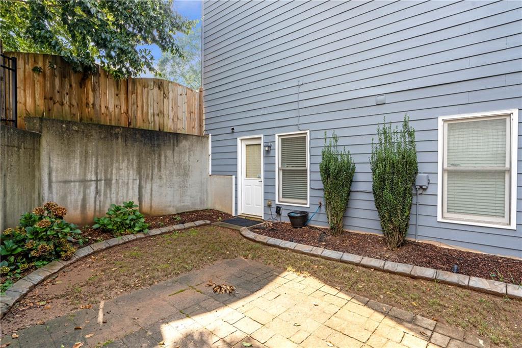 1224 Treemont Trace Winder, GA 30680 - Photo 23 of 27 a front view of a house with garden