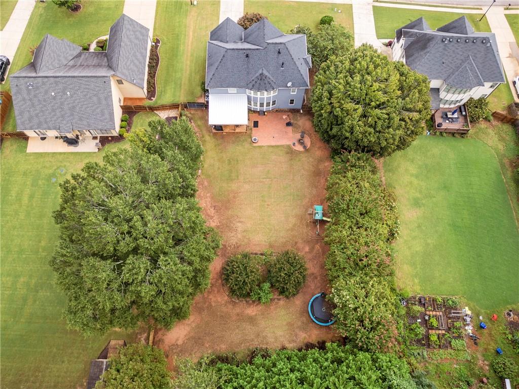 1224 Treemont Trace Winder, GA 30680 - Photo 25 of 27 an aerial view of residential house with outdoor space and swimming pool