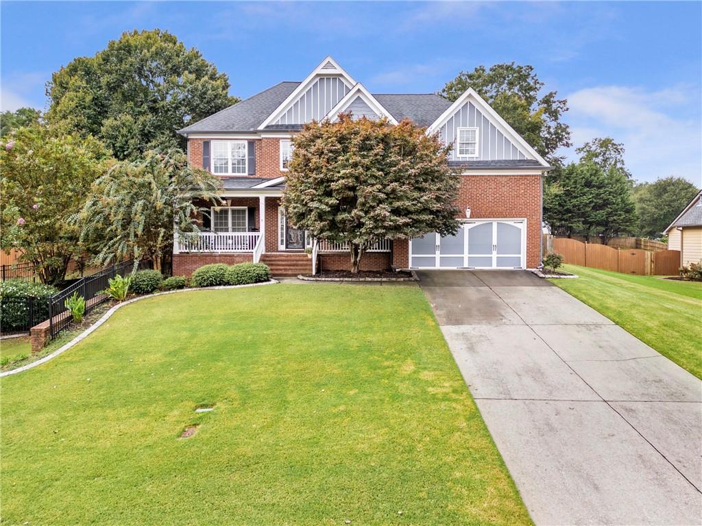 1224 Treemont Trace Winder, GA 30680 - Photo 26 of 27 a view of house with yard