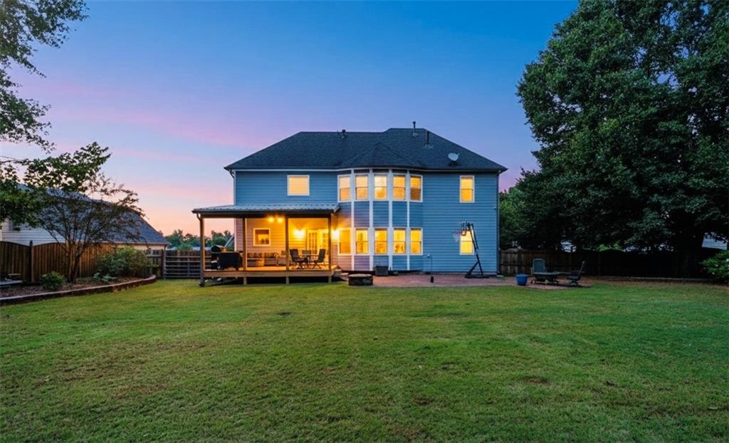 1224 Treemont Trace Winder, GA 30680 - Photo 27 of 27 a view of a house with a big yard
