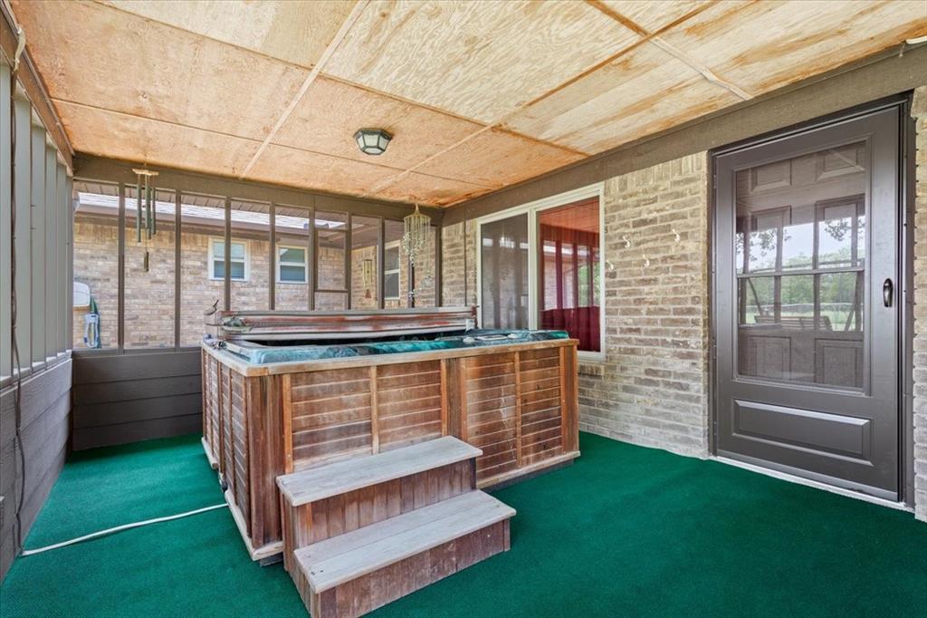 109 Hilltop Street Riesel, TX 76682 - Photo 27 of 32 a view of an chairs and table in balcony