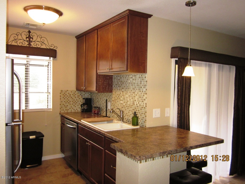 Note custom tile backsplash