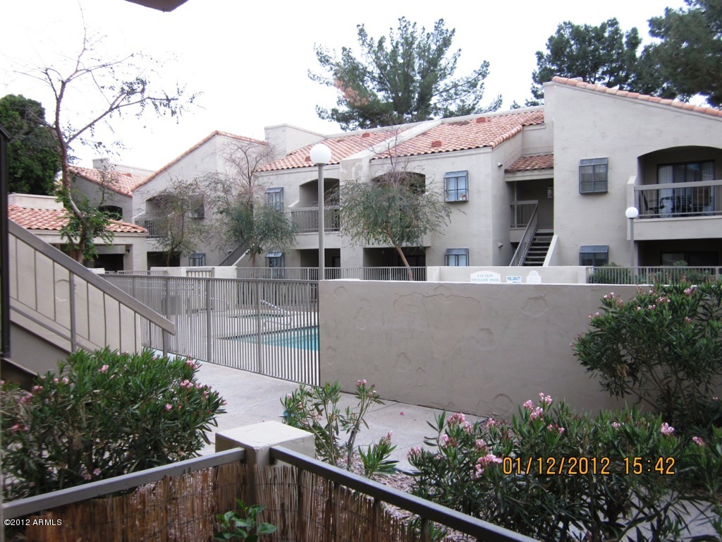 747 South Ext Road, Unit 122 Mesa, AZ 85210 - Photo 9 of 16 Patio overlooks Community Pool