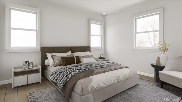a bedroom with bed and window