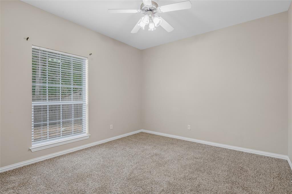 1001 Krenek Tap Road, Unit 801 College Station, TX 77840 - Photo 15 of 21 an empty room with a ceiling fan and window