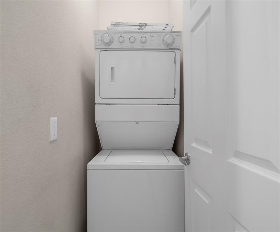 1001 Krenek Tap Road, Unit 801 College Station, TX 77840 - Photo 20 of 21 a utility room with dryer and washer