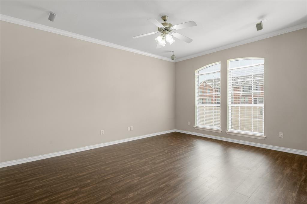 1001 Krenek Tap Road, Unit 801 College Station, TX 77840 - Photo 2 of 21 an empty room with wooden floor and window