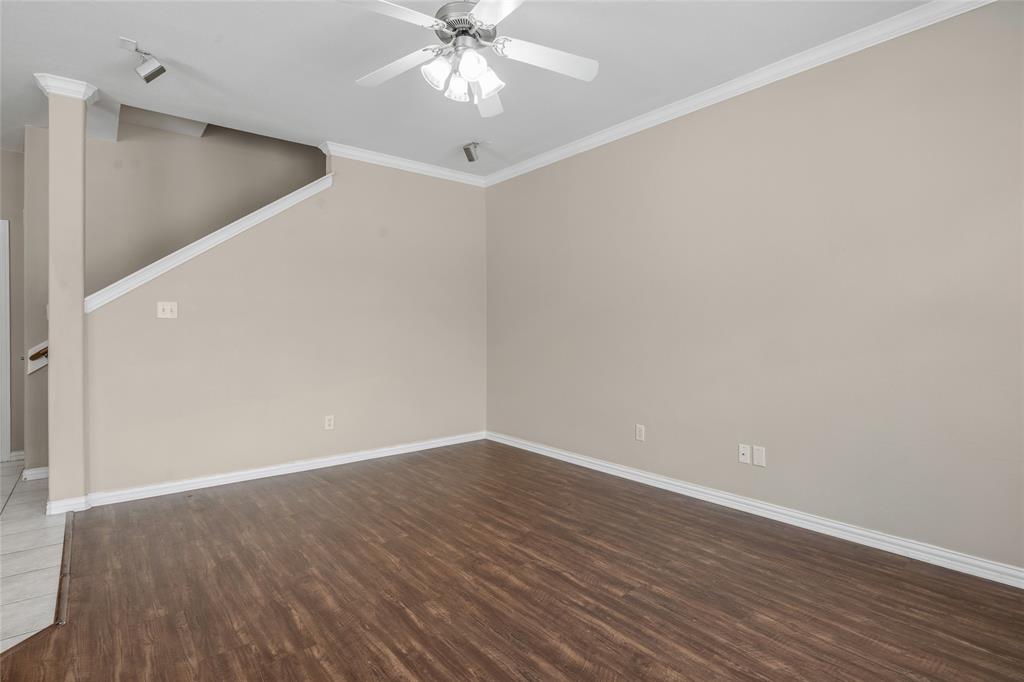 1001 Krenek Tap Road, Unit 801 College Station, TX 77840 - Photo 3 of 21 a view of an empty room with wooden floor