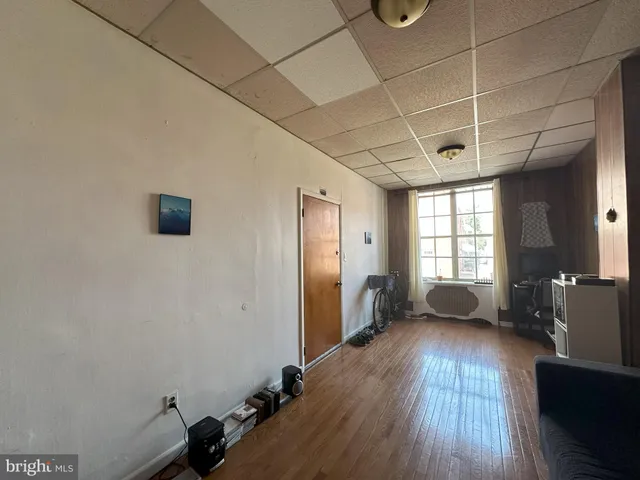 a view of livingroom with furniture and wooden floor