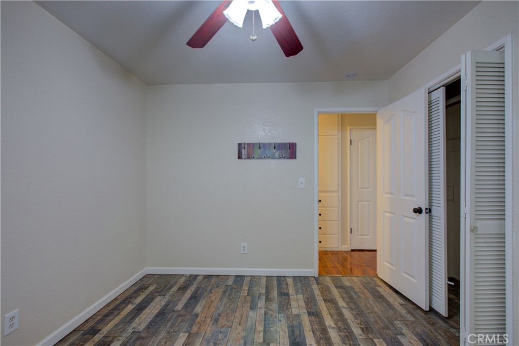 3728 Fuchsia Lane Modesto, CA 95356 - Photo 26 of 47 a view of room with wooden floor