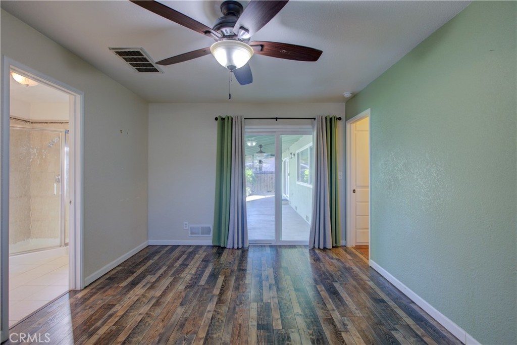 3728 Fuchsia Lane Modesto, CA 95356 - Photo 29 of 47 wooden floor in an empty room with a window