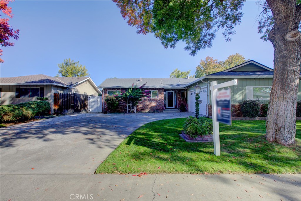 3728 Fuchsia Lane Modesto, CA 95356 - Photo 3 of 47 a front view of a house with garden
