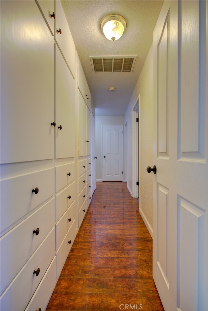 3728 Fuchsia Lane Modesto, CA 95356 - Photo 33 of 47 a view of hallway with wooden floor