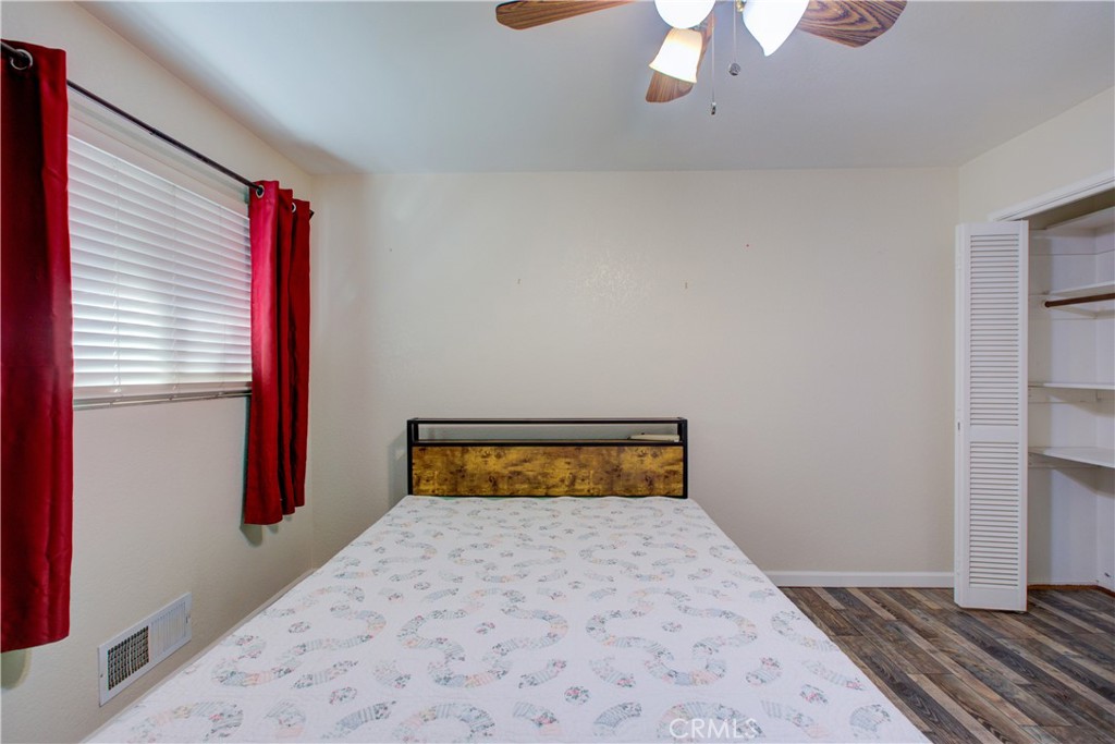 3728 Fuchsia Lane Modesto, CA 95356 - Photo 34 of 47 a bedroom with a bed and a window