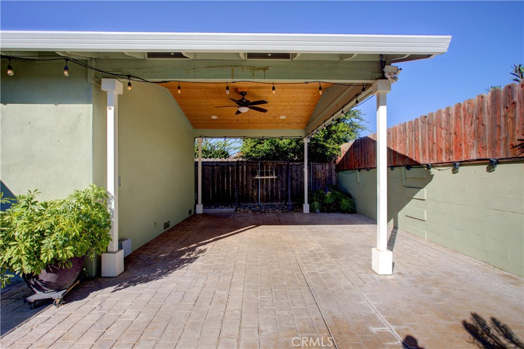 3728 Fuchsia Lane Modesto, CA 95356 - Photo 40 of 47 a view of a patio with a table and chairs