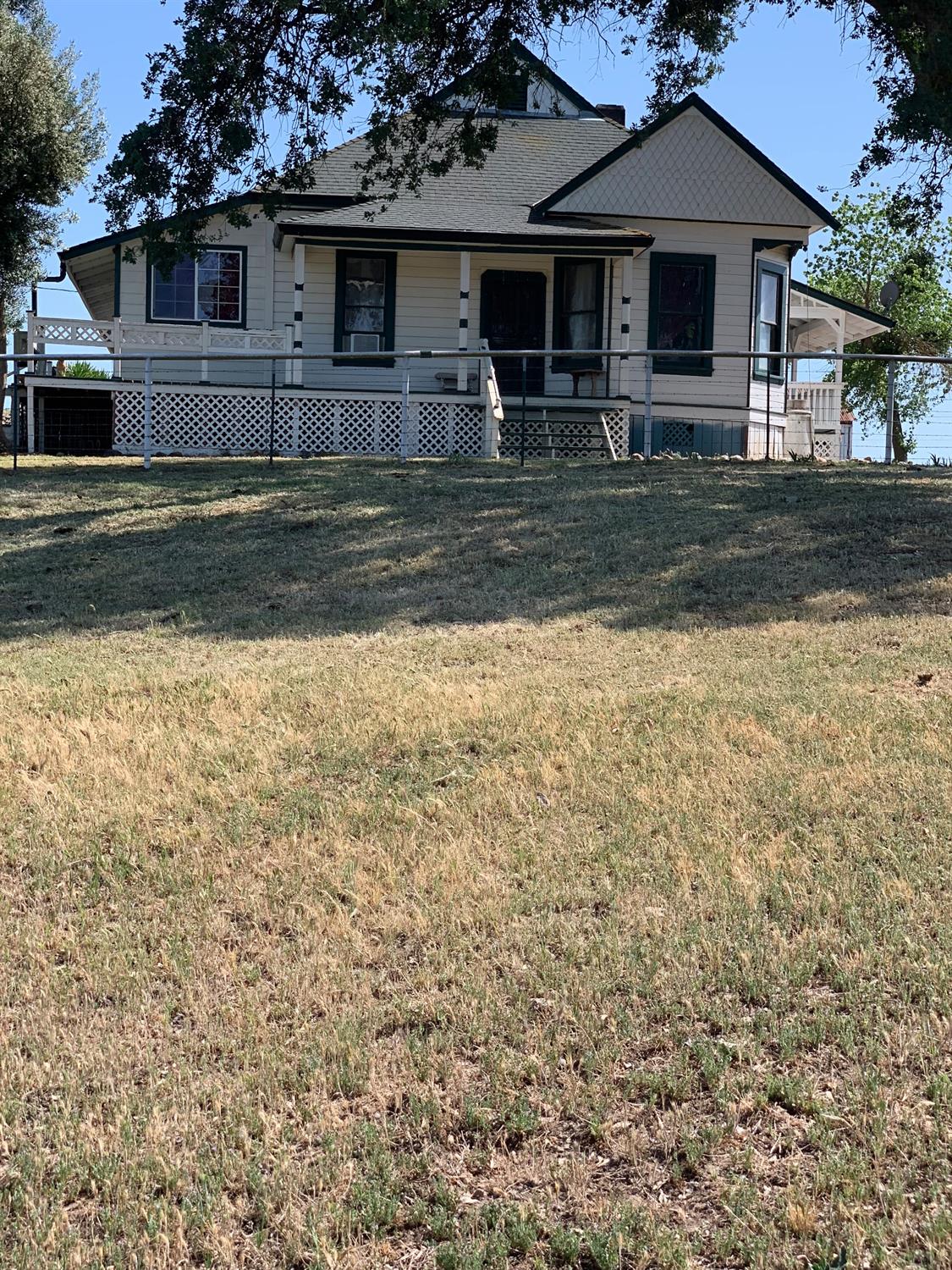 14774 Milton Road Valley Springs, CA 95252 - Photo 17 of 43 a front view of a house with a garden