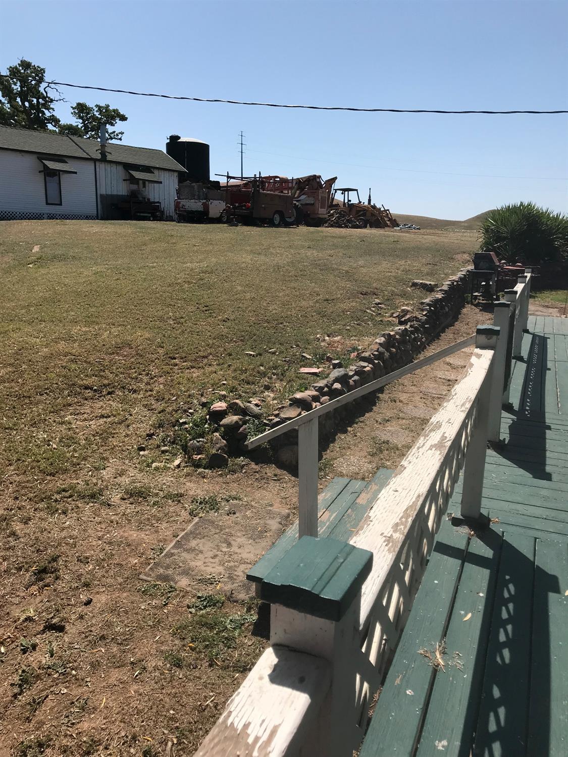 14774 Milton Road Valley Springs, CA 95252 - Photo 20 of 43 a view of a terrace with wooden floor and lake view