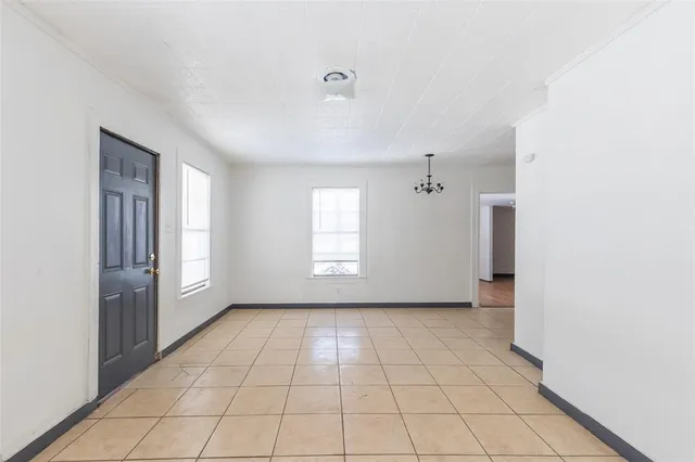 a view of an empty room with window