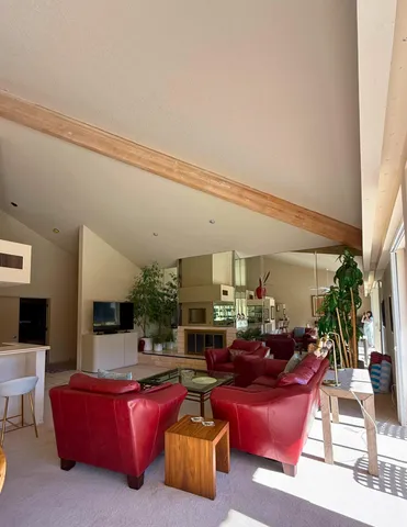 a kitchen with a sink a counter top space cabinets and stainless steel appliances