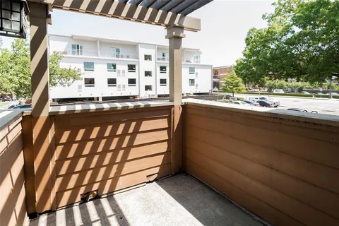 a view of a building from a balcony