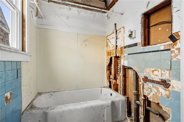 a room with window and wooden floor