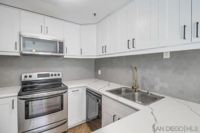 a view of a livingroom with an empty space and window