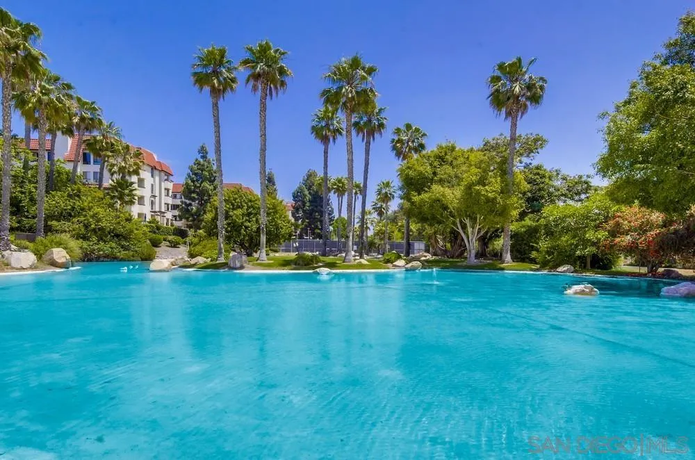 5645 Friars Road, Unit 363 San Diego, CA 92110 - Photo 62 of 74 a view of a garden with a building in the background