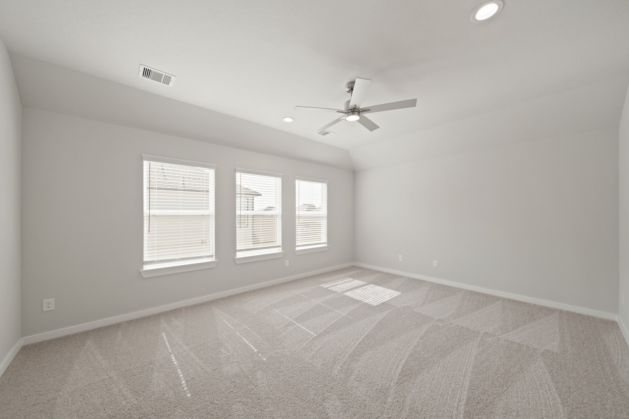 421 Piney Rocks Lane Waller, TX 77484 - Photo 20 of 47 a view of an empty room with a window