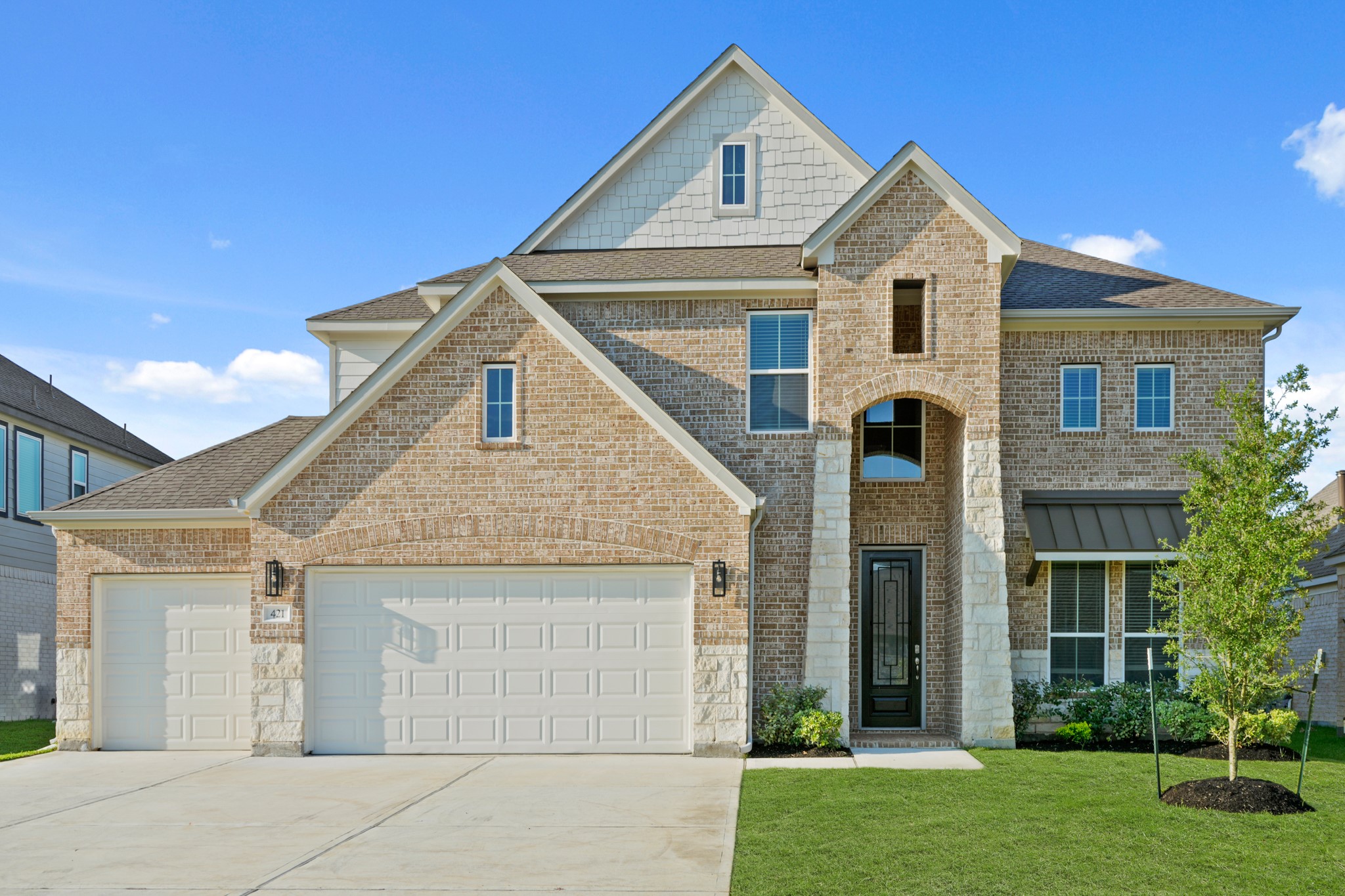 421 Piney Rocks Lane Waller, TX 77484 - Photo 2 of 47 a front view of a house with a yard