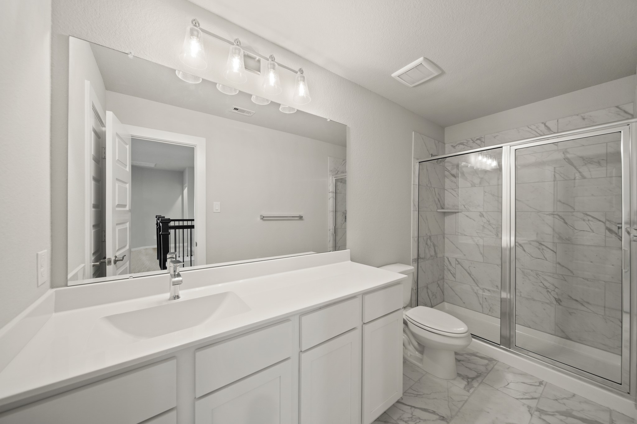 421 Piney Rocks Lane Waller, TX 77484 - Photo 27 of 47 a bathroom with a sink a toilet and shower