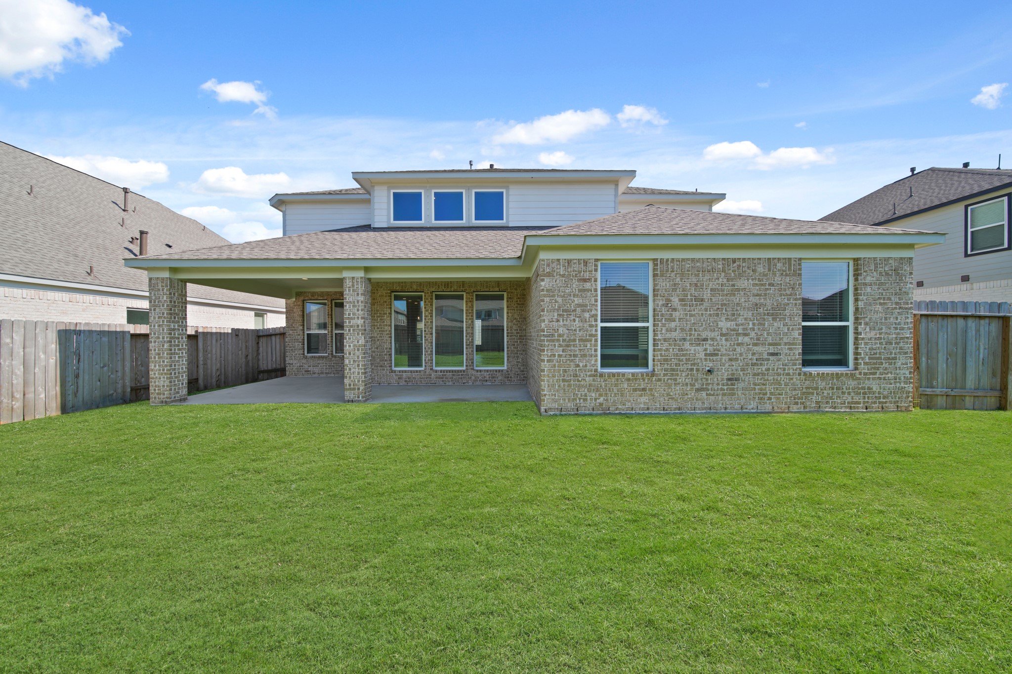 421 Piney Rocks Lane Waller, TX 77484 - Photo 30 of 47 a view of a house with a backyard