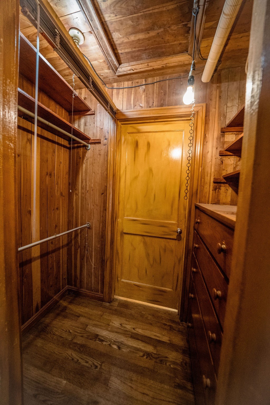 2218 Chapman Street Houston, TX 77009 - Photo 26 of 27 a view of walk in closet with empty racks