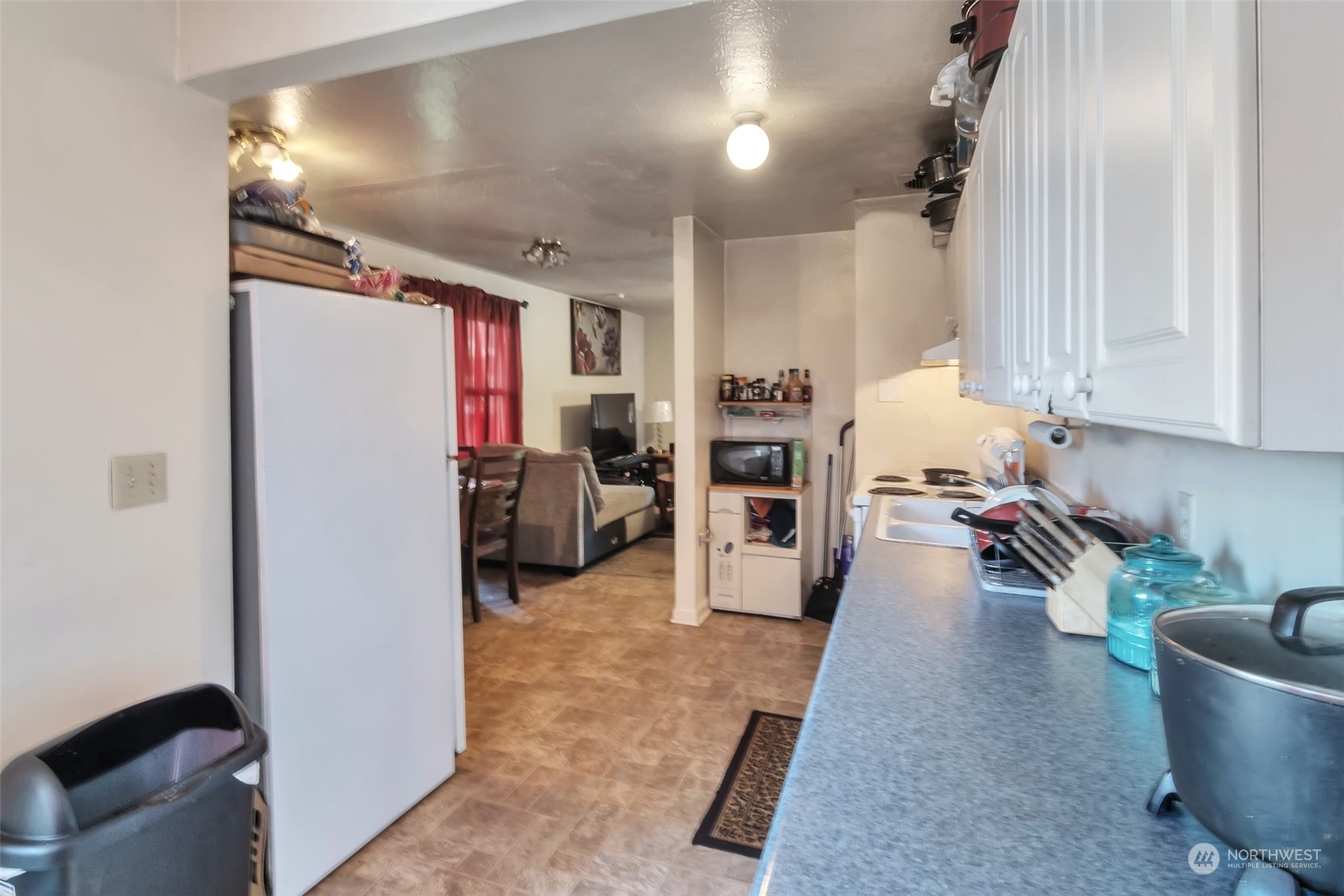 108 Oak Street Bremerton, WA 98310 - Photo 11 of 25 a living room with furniture and a flat screen tv