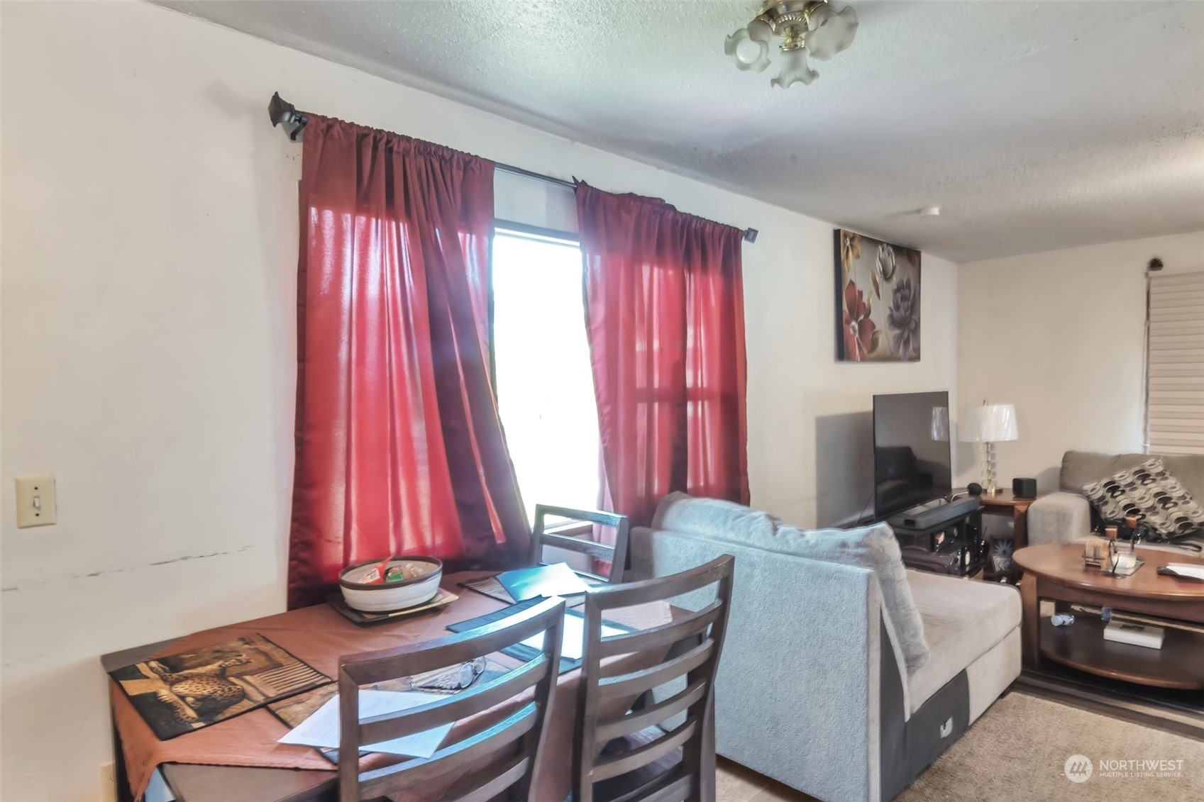 108 Oak Street Bremerton, WA 98310 - Photo 12 of 25 a living room with furniture and a fireplace