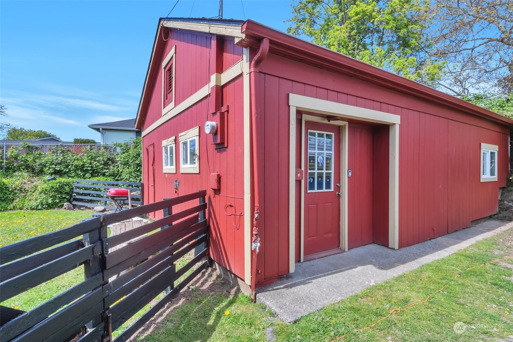 108 Oak Street Bremerton, WA 98310 - Photo 18 of 25 a view of a house with a small yard and wooden fence