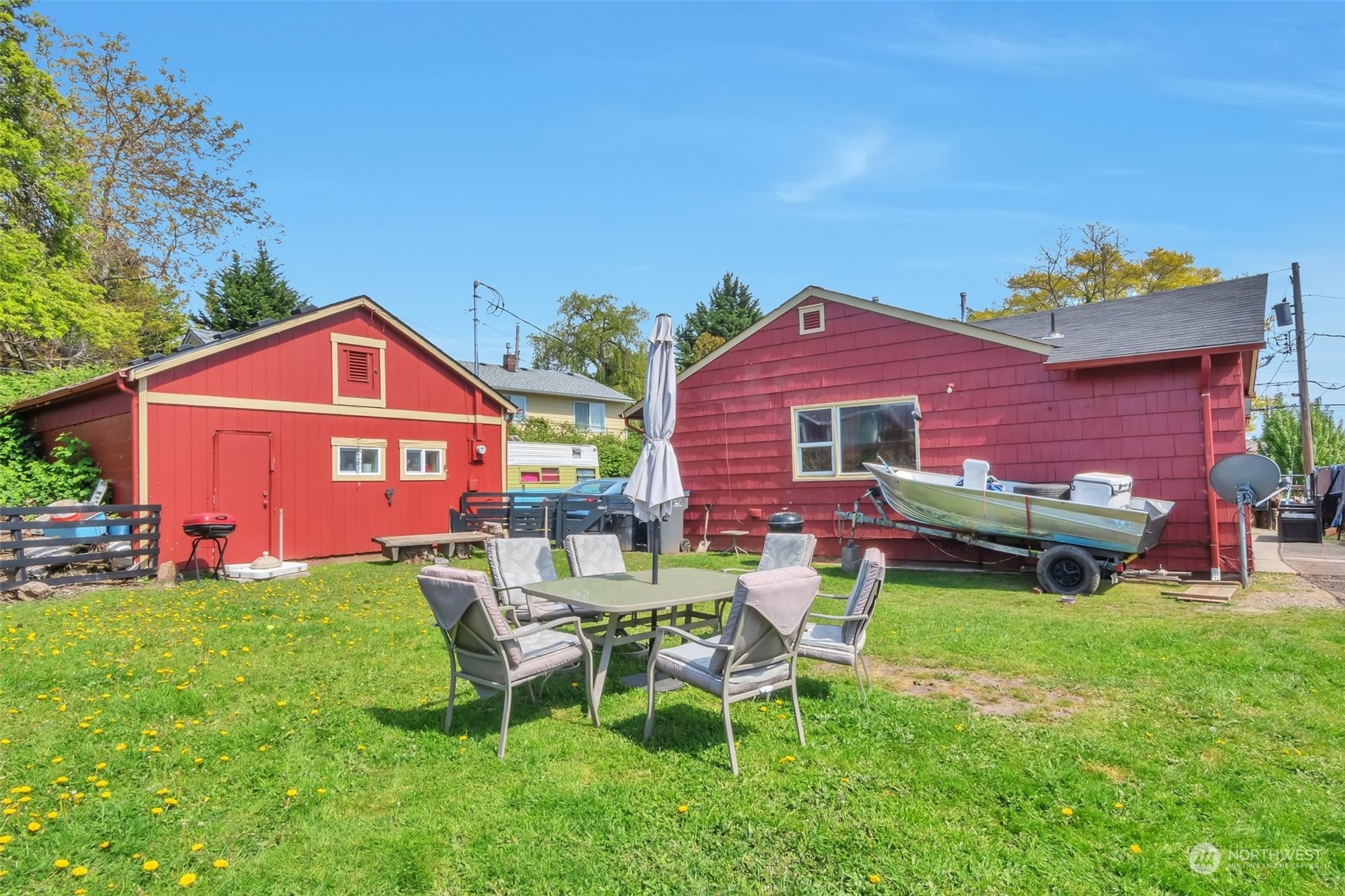 108 Oak Street Bremerton, WA 98310 - Photo 22 of 25 a front view of a house with a yard table and chairs