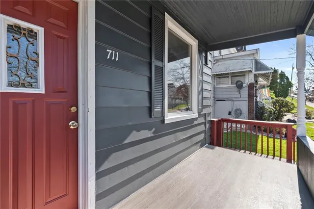 a view of front door and deck