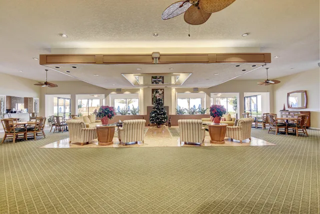a view of a living room and chandelier