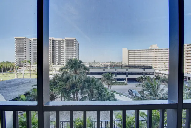 a view of balcony with furniture