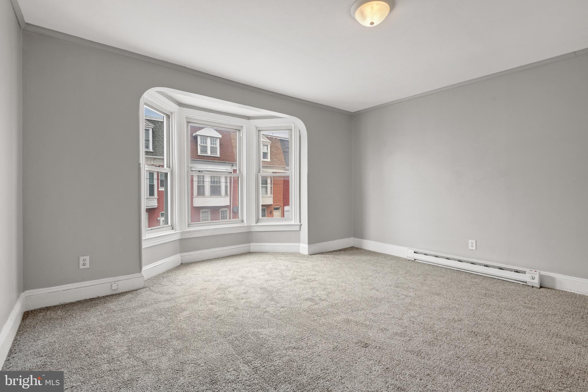 958 East Princess Street York, PA 17403 - Photo 16 of 27 a view of an empty room with a window