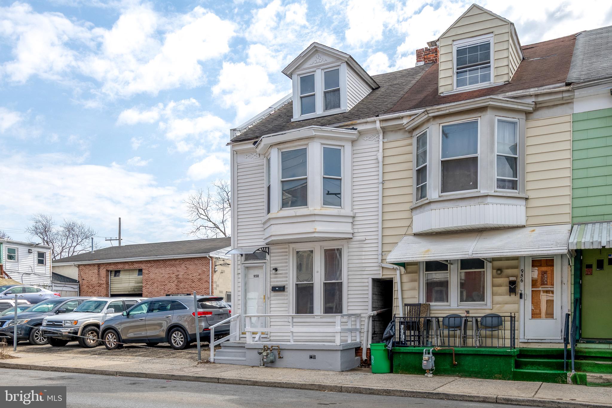 958 East Princess Street York, PA 17403 - Photo 2 of 27 a front view of residential houses with street