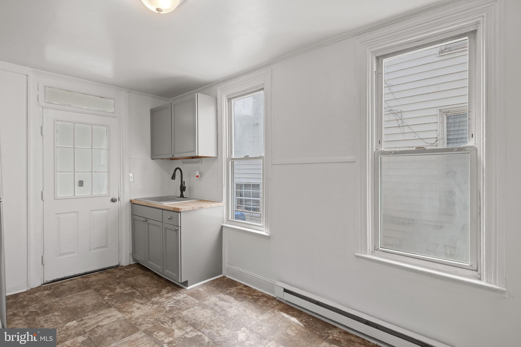 958 East Princess Street York, PA 17403 - Photo 9 of 27 a view of kitchen with sink cabinets and window