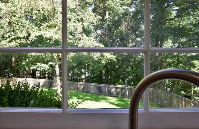 a view of a yard from a balcony