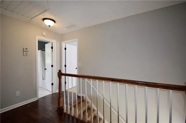 a bed room with a bed and a window