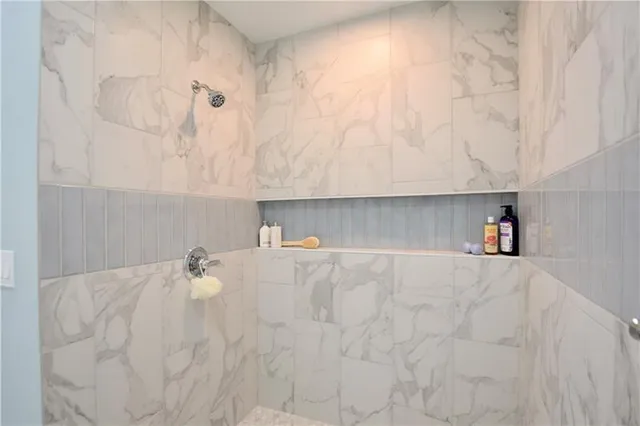 a bathroom with a bathtub sink and toilet