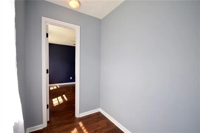 an empty room with an entryway
