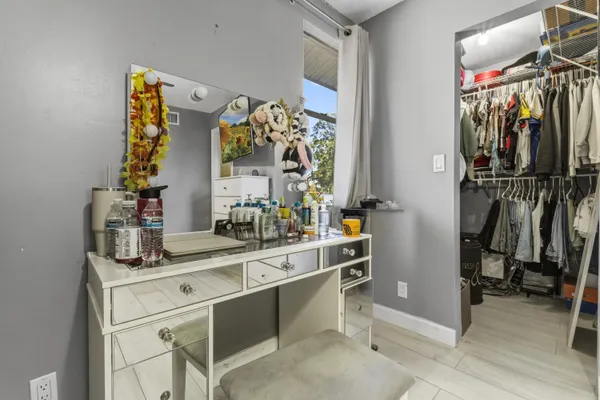 a view of room with furniture and a flat screen tv